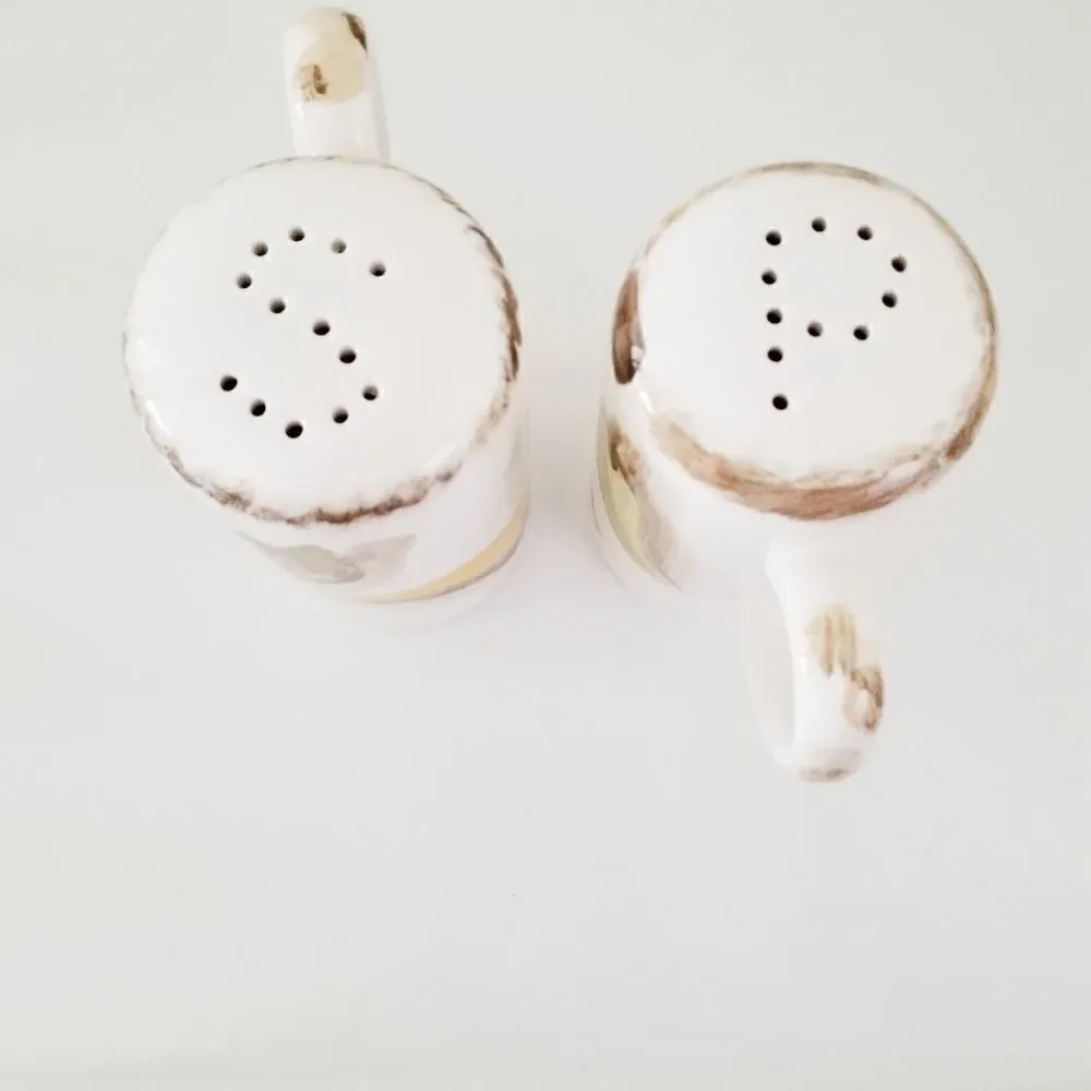 Vintage salt and pepper shakers with hot peppers